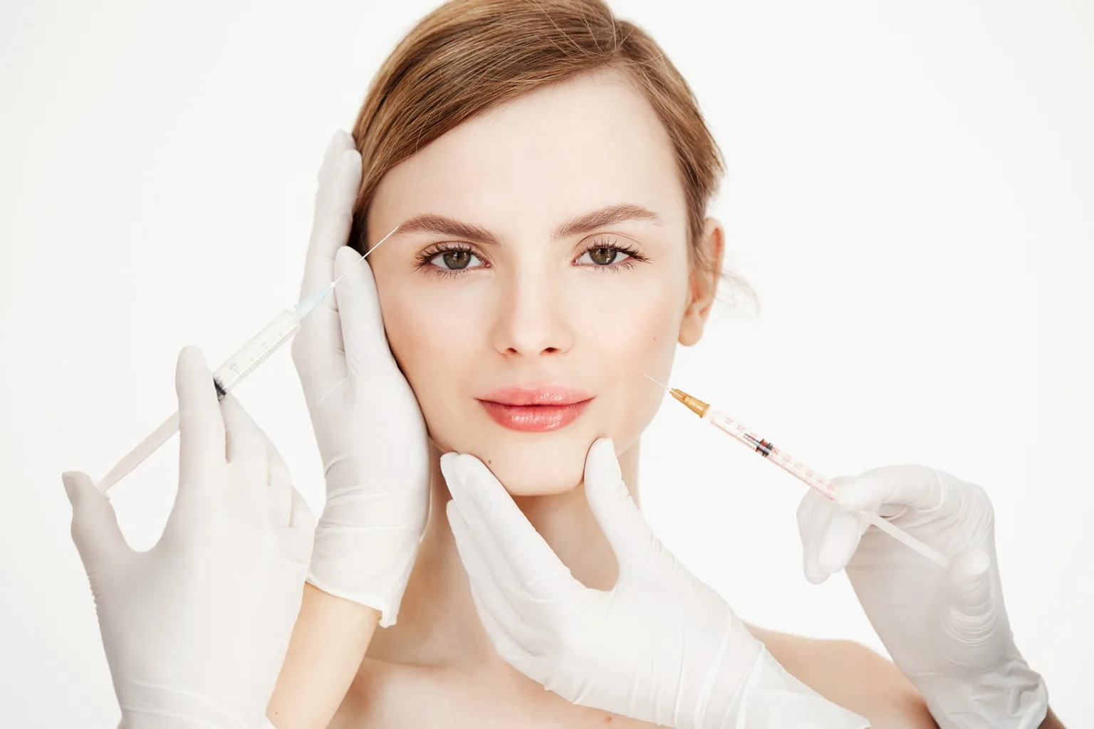 cosmetologists hands making medical botox injections beautiful blonde skin lifting facial treatment beauty spa 1 Injectables